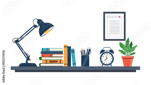 Highly organized office desk featuring a blue desk lamp a stack of textbooks an alarm clock and a potted green plant.