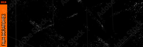 Retro film background with scratch dirt on paper, faded movie light and grain, vintage film look with paper scratch texture.