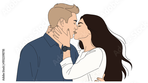 Romantic moment of a young couple kissing with the woman holding the mans face while their hair blows in the gentle wind during a sunset date.