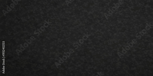 Black Textured Surface: A close-up view reveals the intricate details of a black textured surface, showcasing its subtle variations and tactile qualities.