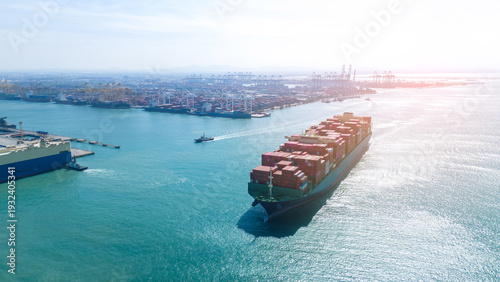 Wallpaper Mural Massive container ship arriving at a busy commercial port with cranes. Global maritime logistics, international sea freight trade, and shipping industry supply chain business concept. Torontodigital.ca