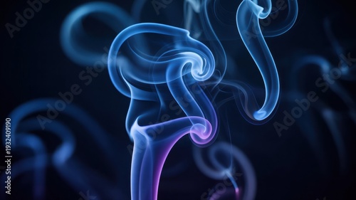 Abstract blue smoke swirls in dark ambient lighting