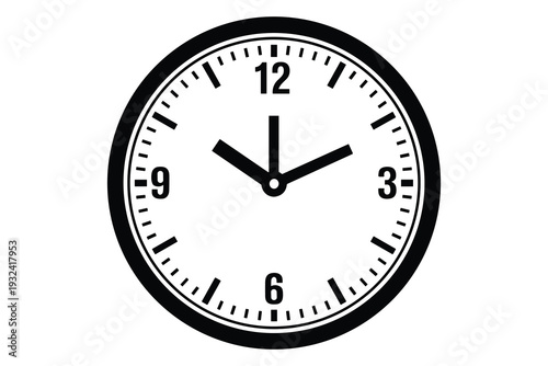 Clock Face Showing Nine O'Clock with Black Hands and Numbers on White