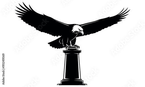 A majestic bald eagle spreading its wings on a pedestal