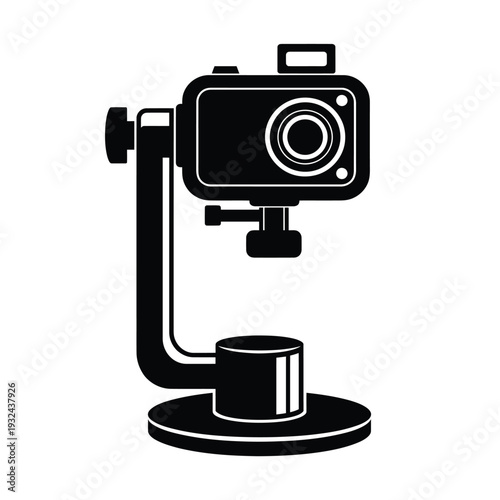 Black and white illustration of a vintage camera on a tripod stand