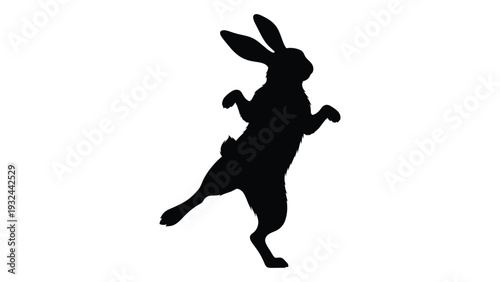 A black silhouette of a rabbit in mid leap against a plain white background