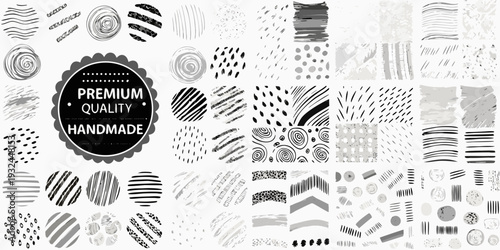 Abstract black and white patterns arranged in a rectangular grid layout