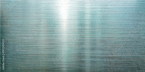 An abstract blue grunge background with a brushed silver metallic texture and weathered fabric pattern creates a sophisticated steel gray design on an old linen canvas material