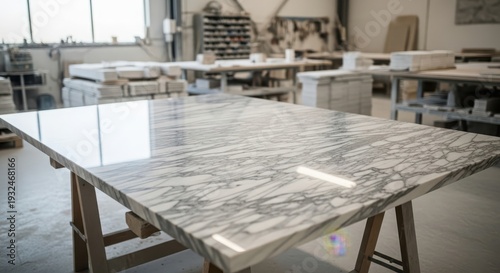 Marble table top on metal sawhorses in workshop