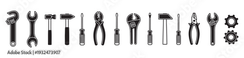 Set of black construction hand tools icons including wrenches hammers and screwdrivers
