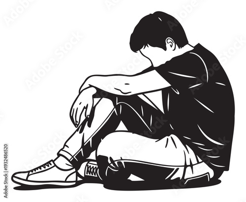 Young person sitting quietly on the ground with head bowed, expressing emotions of loneliness, contemplation, or sadness, ideal for projects depicting mental health awareness, solitude, or