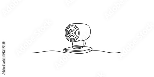 A simple black and white line drawing of a round webcam sitting on a flat surface