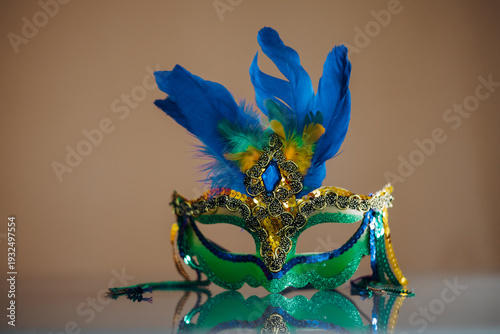 Photo of elegant and delicate Venetian mask over dark background - banner