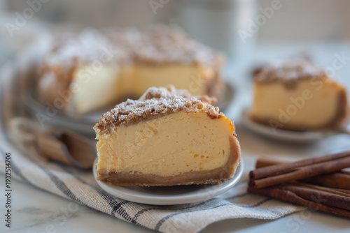 Wallpaper Mural piece of caramel cheesecake with cinnamon sticks Torontodigital.ca