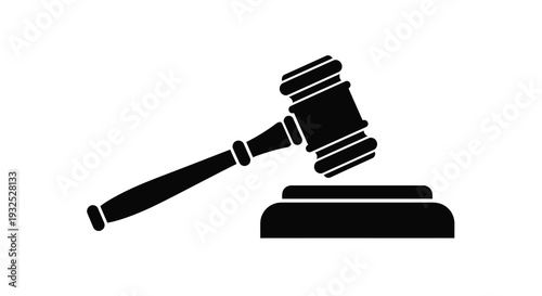 A stark black silhouette of a judge s gavel resting on a sound block symbolizing law and order silhouette