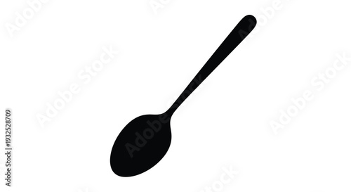 A simple stark black spoon is displayed against a bright white background creating a striking silhouette high quality professional