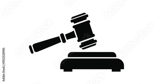 A stark black silhouette of a gavel resting on a sound block represents justice law and legal proceedings silhouette