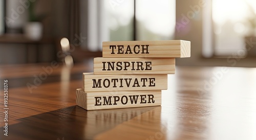 stacked wooden engraved blocks with motivational text, warm sunlit office desk educational leadership Concept