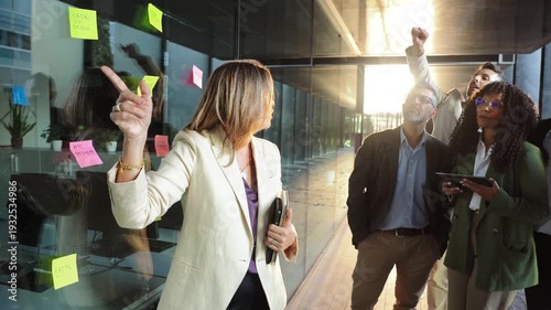 Team members actively participating in a brainstorming session, discussing ideas and strategies for successful collaboration in a dynamic business environment, fostering teamwork and creativity.