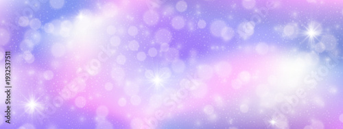 Sparkling pink and purple background with a whimsical bokeh, glare star effect