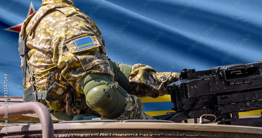 Fototapeta premium Aruba flag with soldier at machine gun turret in front of it. Closeup side view.