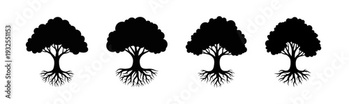 Four Silhouetted Trees with Visible Roots on a White Background A Symbol of Growth, Nature, and Strength