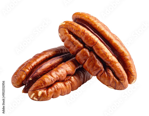 Two whole, rich brown, ribbed pecan halves with textured surfaces on black