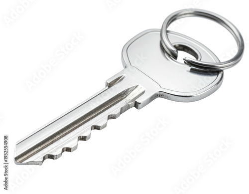 A shiny metal key with a ring is isolated on a black background