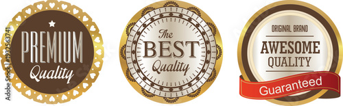 Three gold quality labels on a white background