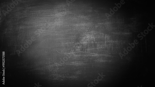 Chalk rubbed out on blackboard background. 