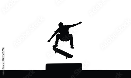 Silhouette of a person performing a skateboard trick on a ramp