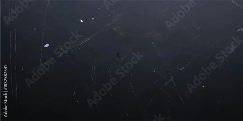 Scratched dark metal surface with dust and small imperfections, grunge texture background for edgy and worn designs.