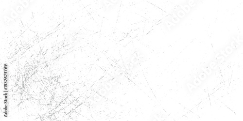 White background with scattered grey scratches and speckles creating a distressed texture effect
