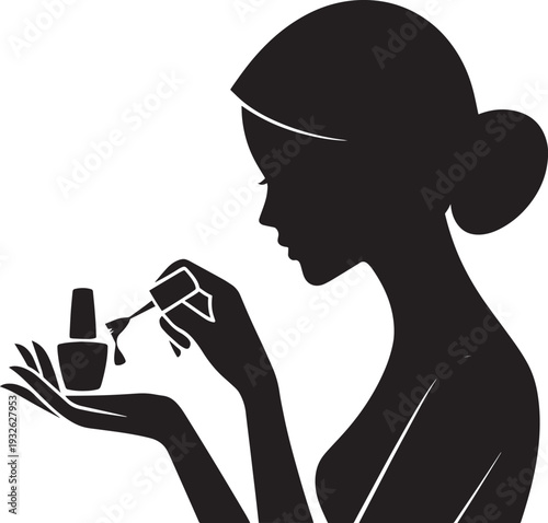 Silhouette of woman applying nail polish on her hand in profile view
