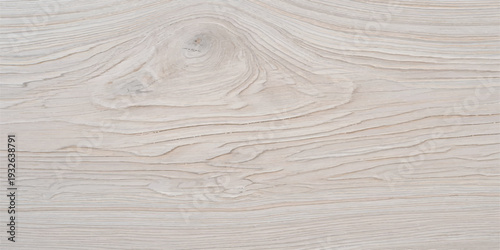 Close-up of bleached wood grain with natural wavy lines, providing a light, airy textured background for design.