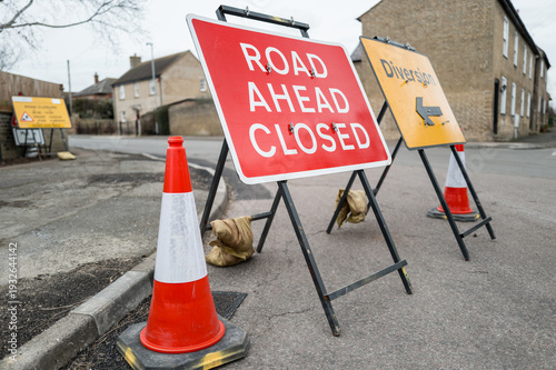 Photography Typical road work signs seen on a road junction in Britain