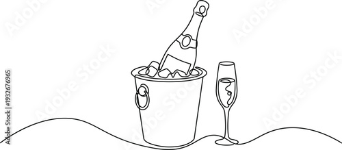 Champagne bottle in ice bucket with glass celebration setup festive drink party accessory luxury beverage