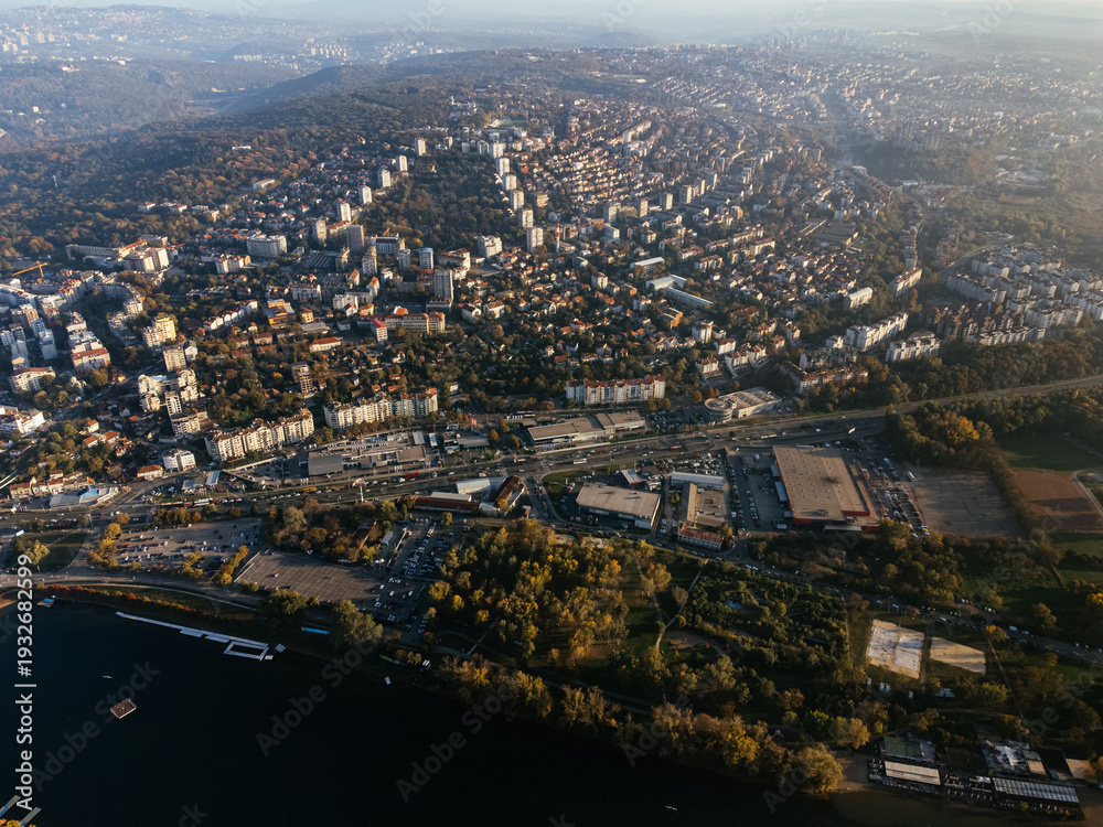 Fototapeta premium Drone view above the open public park and green trees. Europe. 4K.