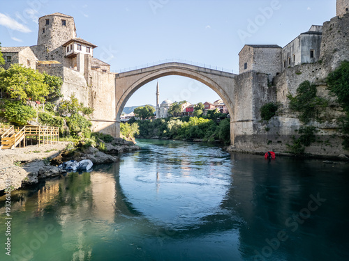 Fényképezés Bosnia and Herzegovina 05 28 2025: Frontal drone photo of Old Bridge Mostar in O