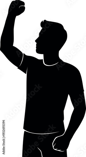 Silhouette of a man raising his fist in a gesture of triumph