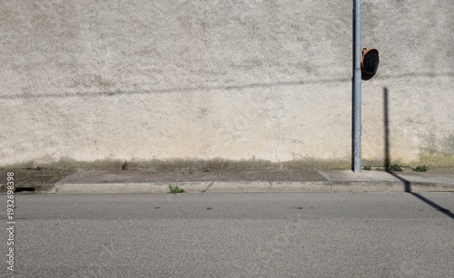 Wallpaper Mural Rough concrete wall with road convex mirror on the right. Dirty concrete sidewalk and asphalt road in front. Grunge background for copy space Torontodigital.ca