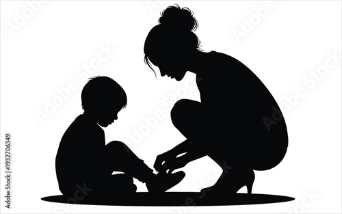 Mother tying child's shoelaces