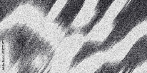 Abstract monochrome background with bold diagonal stripes and soft blurry dark areas creating a dynamic zebra-like pattern with a grainy texture for visual impact