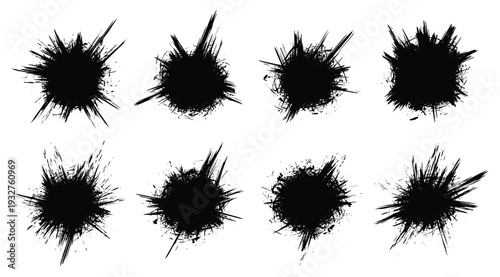 Eight black ink splatters on a white background for design and artistic purposes
