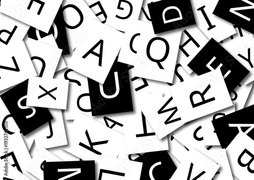 Scattered alphabet letter cards symbolizing language,