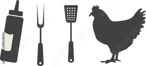 A chicken and some grilling utensils