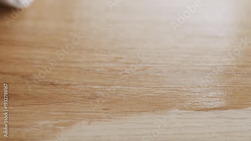 Wallpaper Mural Slow motion applying oil finish to oak surface with cloth Torontodigital.ca