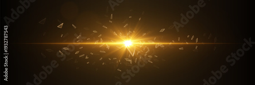 Golden light burst with glass shards explosion and bright horizontal flare on dark background