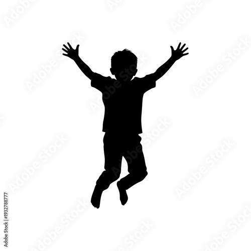 Silhouette of a Jumping Happy Young Boy.