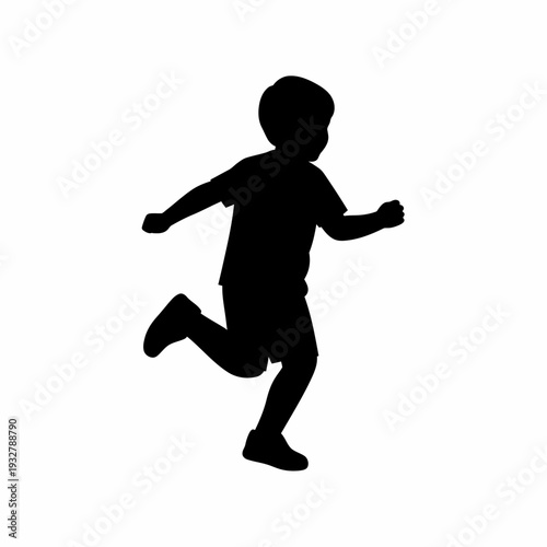 Silhouette of a Running Young Boy.
